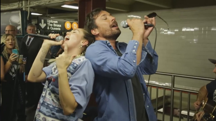 Miley Cyrus Busks in NYC Subway in Disguise